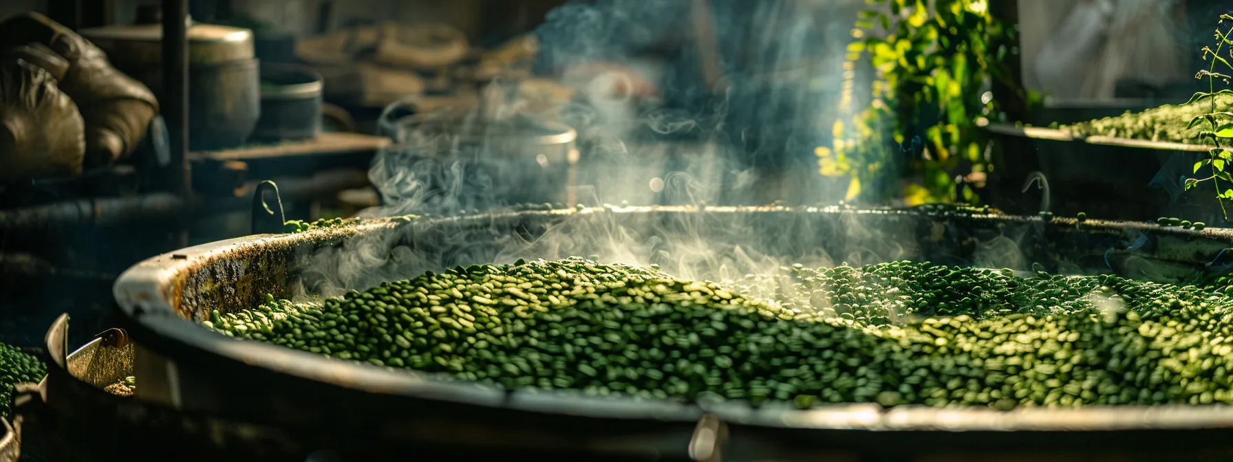 a close-up photo of a coffee roaster machine filled with aromatic green beans from yemen, with wisps of fragrant smoke rising from the top.